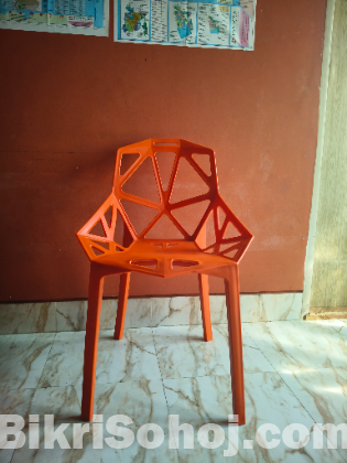 Stylish red ochre colour study chair